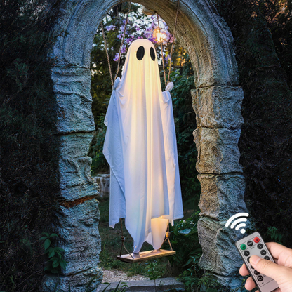 Halloween hanging ghost decoration in a yard display